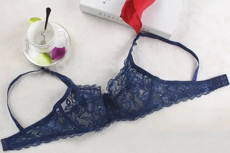 Navy blue lace underwire push-up bra for women with floral lace and adjustable straps.