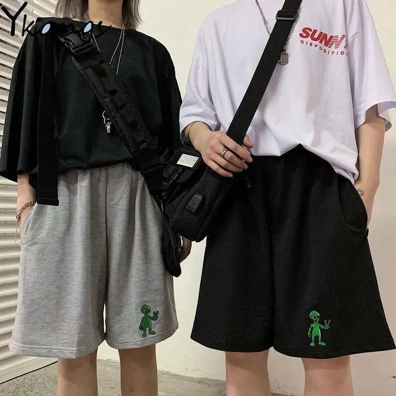 Summer shirts for women by Simples Market; casual outfits in black and white tops with shorts, green alien graphics