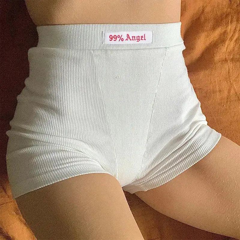 White ribbed high-waisted biker shorts for women with a 99% Angel waistband label