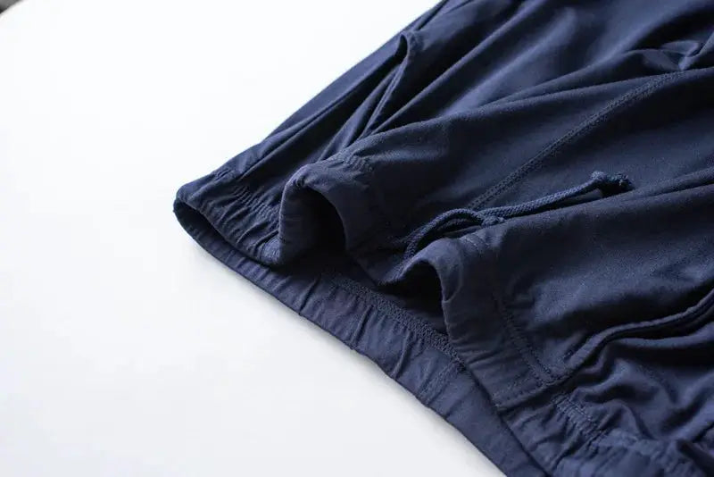 Men's spring and summer new modal pajamas two-piece short-sleeved trousers thin large size loose sports home wear suit sleepwear