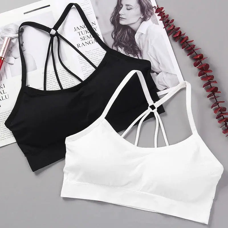 Sports bra tops set in black and white with crisscross back straps; includes 2 bras.