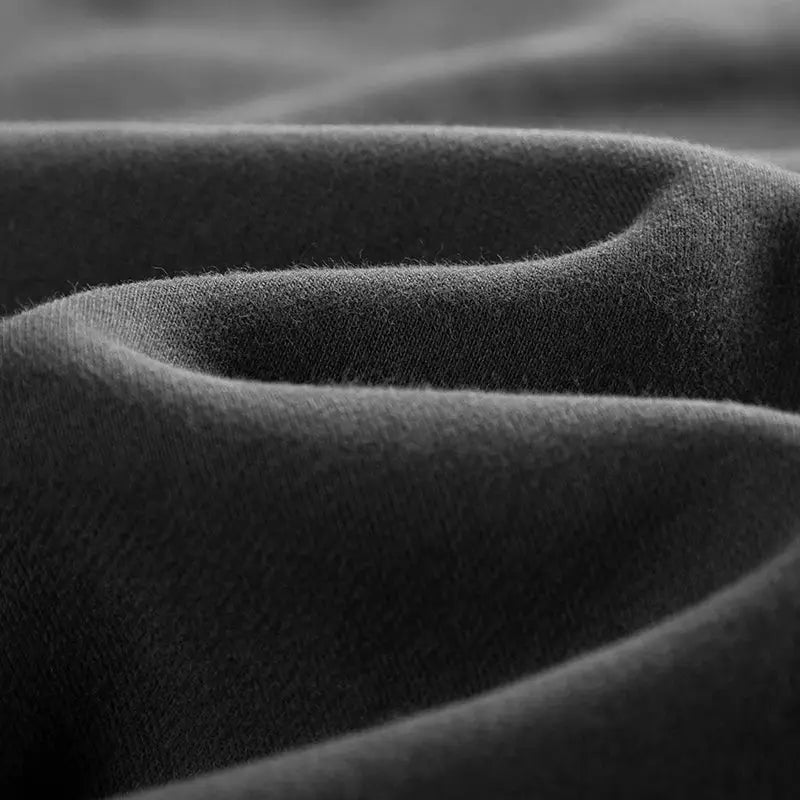 Fleece sweatpants fabric in black with soft texture