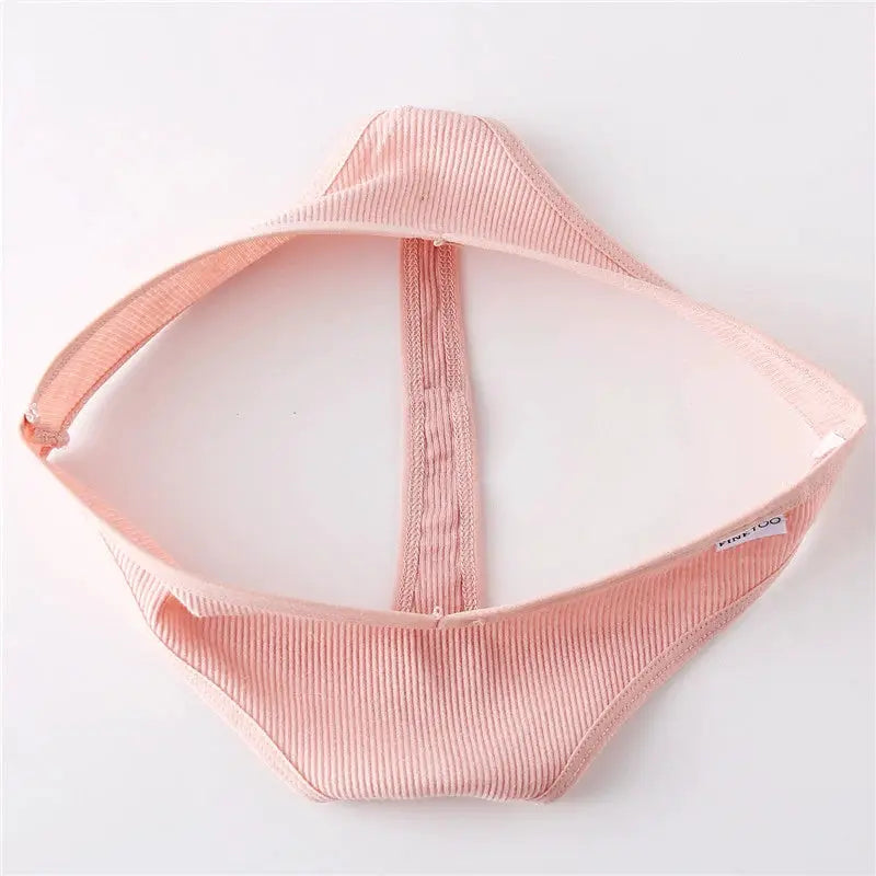 Pink ribbed cotton thong underwear for women, low-rise bikini style.