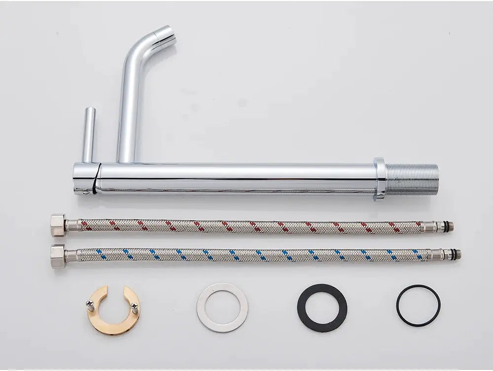 Chrome basin faucet with two braided supply hoses and mounting hardware for bathroom installation