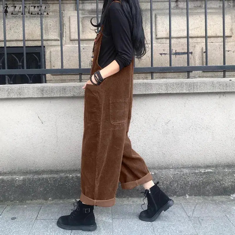 Corduroy overalls jumpsuit by ZANZEA in brown, paired with a black top and black boots.