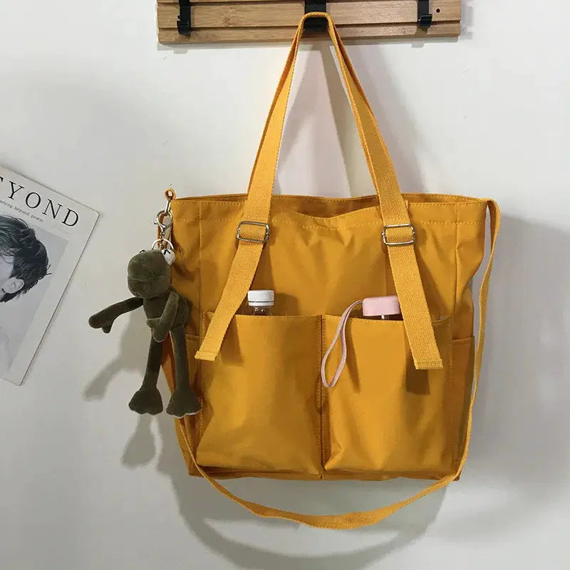 Waterproof Oxford large-capacity mustard-yellow handbag for women with dual top handles and front pockets