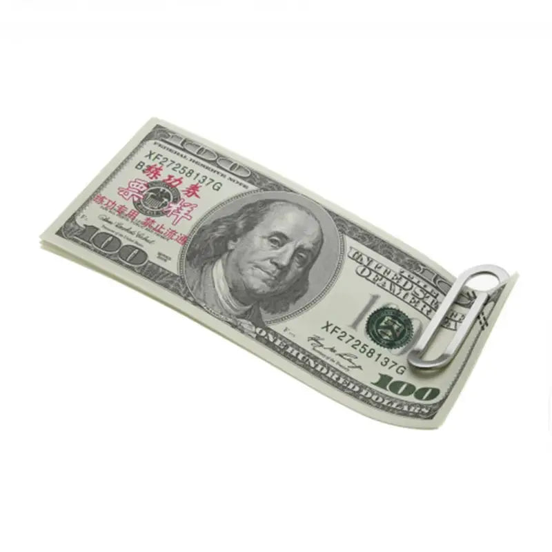 Money clip stainless steel holds a US $100 bill, compact and secure