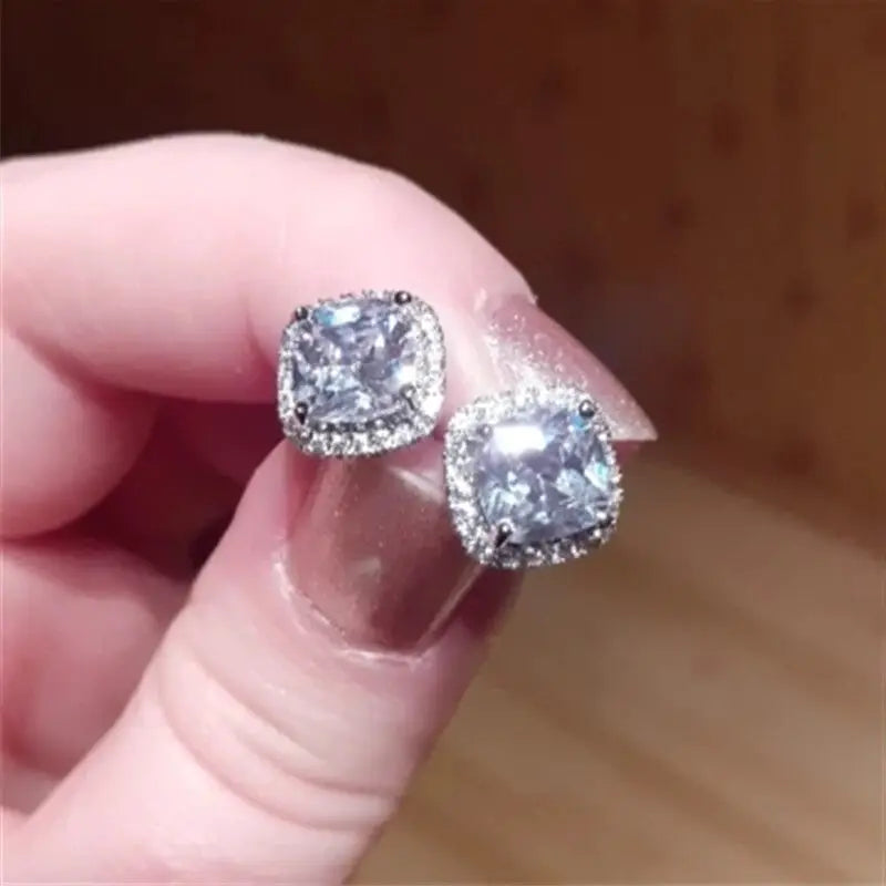 Huitan cushion-cut cubic zirconia stud earrings, pair with halo setting in silver-tone