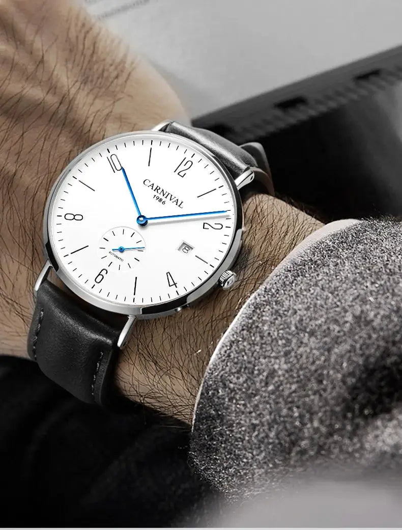 Carnival men's wristwatch, white dial with blue hands, black leather strap, calendar date