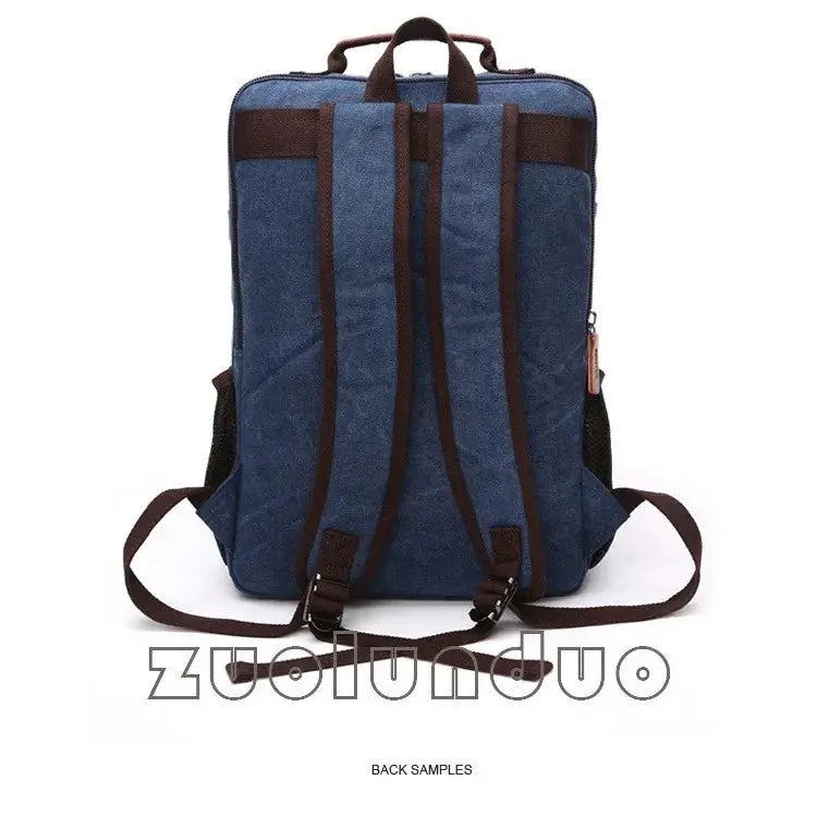 Backpack blue canvas with brown straps, back view, vintage large-capacity travel bag