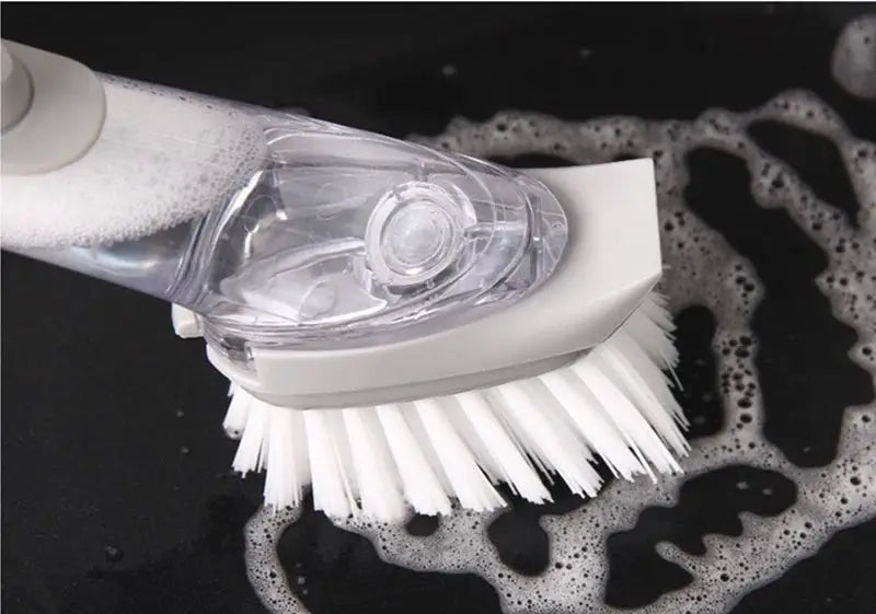 Refillable liquid cleaning brush with long handle and dish soap dispenser, Simples Market, white bristle head.