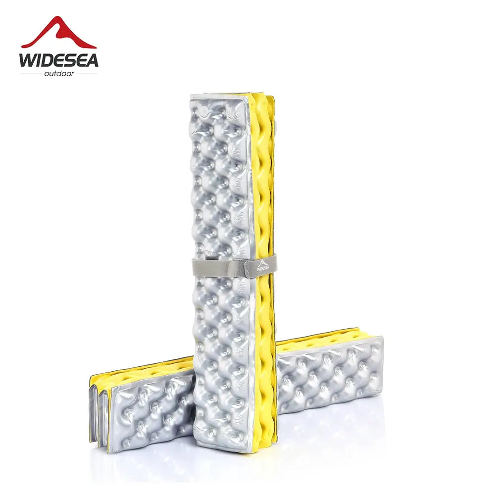 Widesea outdoor foldable camping mat; two ultralight XPE foam pads, silver-gray with yellow edges, strapped.