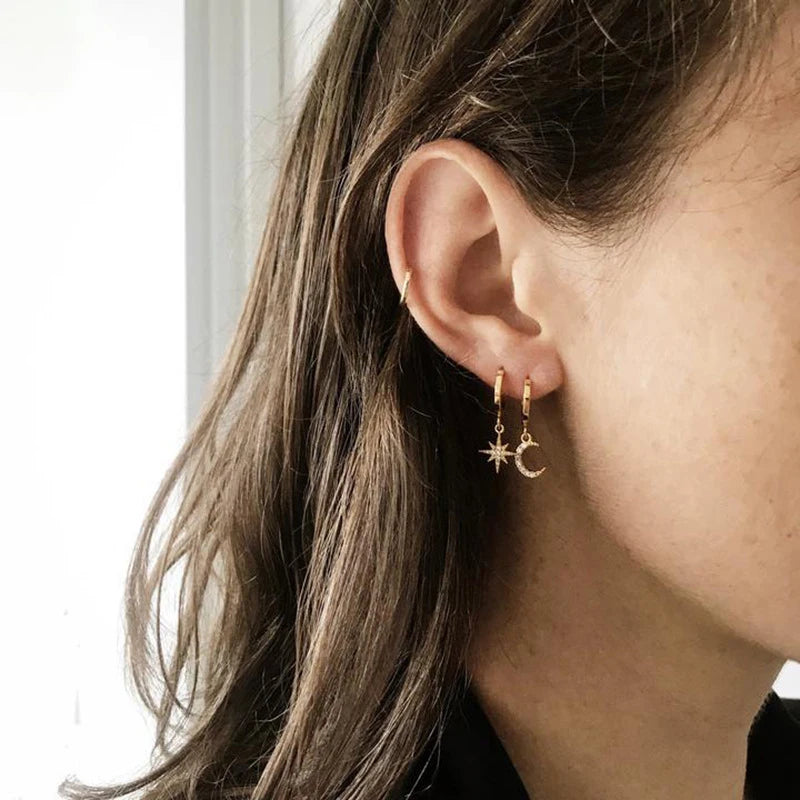 Geometric star and moon gold-tone dangle earrings for women, asymmetric pair