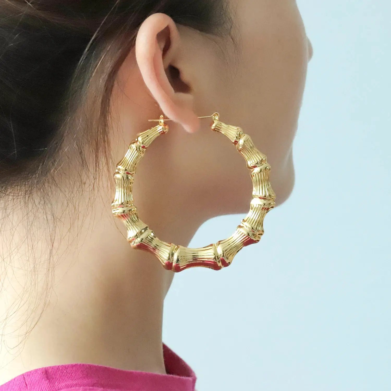 Bamboo hoop earrings in gold-tone with segmented textured design