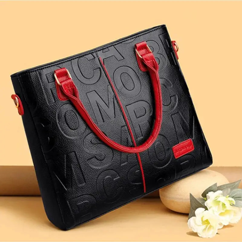 PU leather crossbody tote bag for women, Simples Market, black embossed pattern with red handles, large capacity