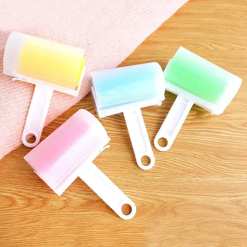 Sticky roller set by Simples Market; washable pet hair remover with four pastel rollers on white handles