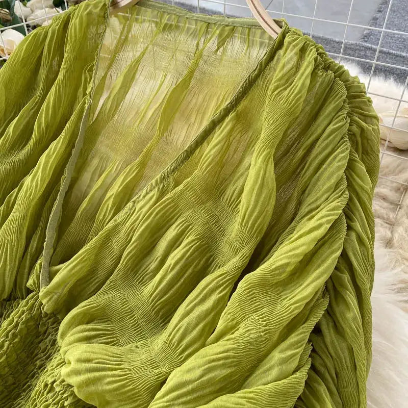 Chiffon blouse in lime green with draped design, puff sleeves and smocked waist