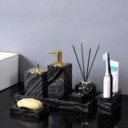 Ancient wood-grain black marble bathroom set with gold accents; dispenser, toothbrush holder, diffuser, soap dish