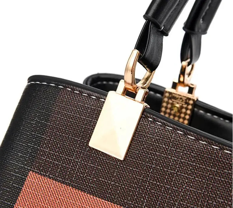 Elegant designer handbag by Simples Market, brown textured PU leather with gold-tone hardware and black shoulder straps
