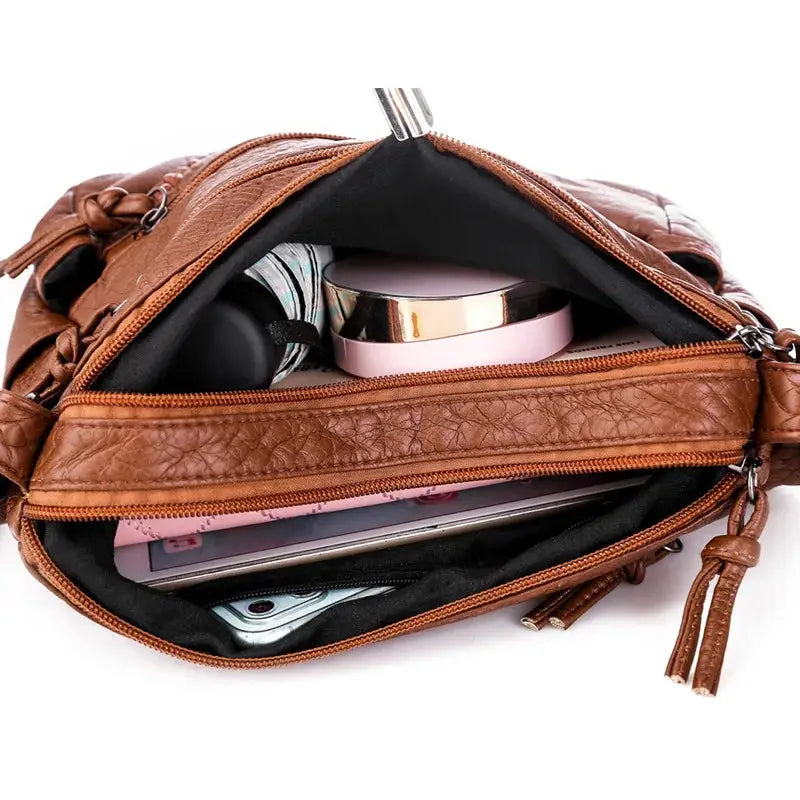 Top selling women’s brown PU leather messenger bag with multiple zip compartments