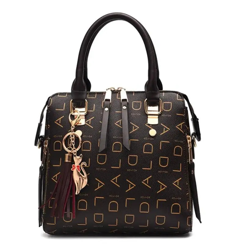 Fashion English Letter Handbag; black PU leather tote with gold letter print, top-handle, tassel charm, large capacity