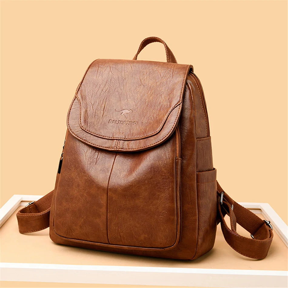 Genuine women's soft brown leather backpack by Simples Market; stylish shoulder bag