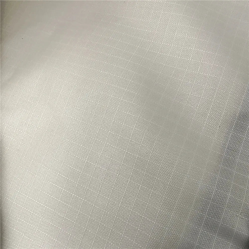 Camping mat fabric in silver-grey with a fine woven texture.