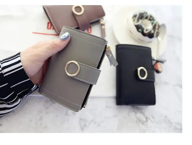 Women's PU leather short zipper wallets with ring detail; set of three in gray, black and brown by Simples Market