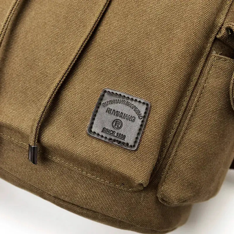 Canvas backpack brown by Simples Market, large men’s travel/school bag with front patch logo