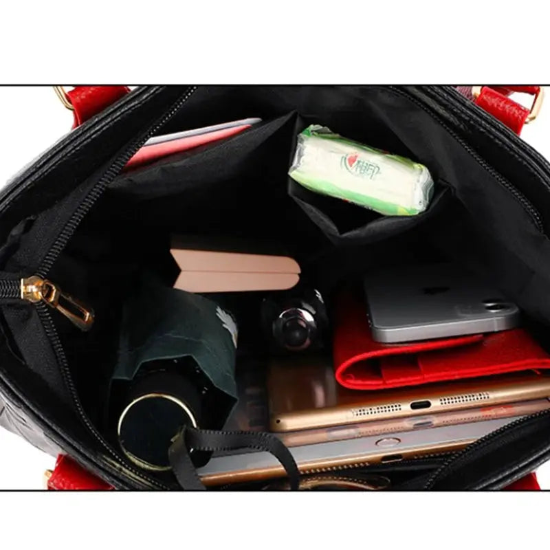 Simples Market PU leather crossbody bag; black interior with red accents, large-capacity tote with phone and wallet.
