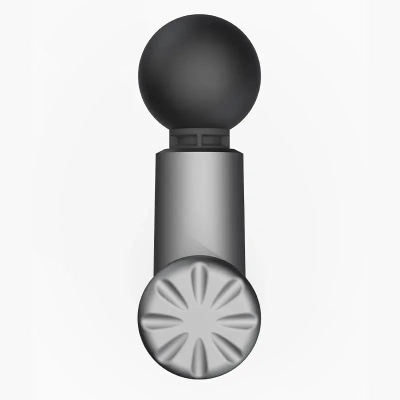 Booster Mini X massage gun by Simples Market; compact silver body with black round head.