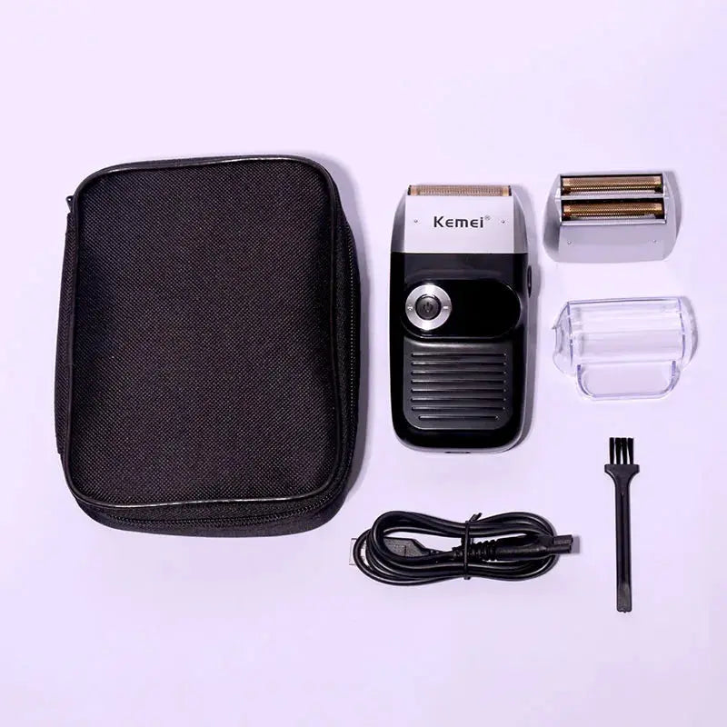 Kemei electric shaver kit (6 pieces) with black travel case, USB cable, and cleaning brush