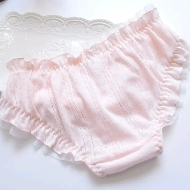 Pink cotton ruffle panties with bow detail, breathable and highly elastic