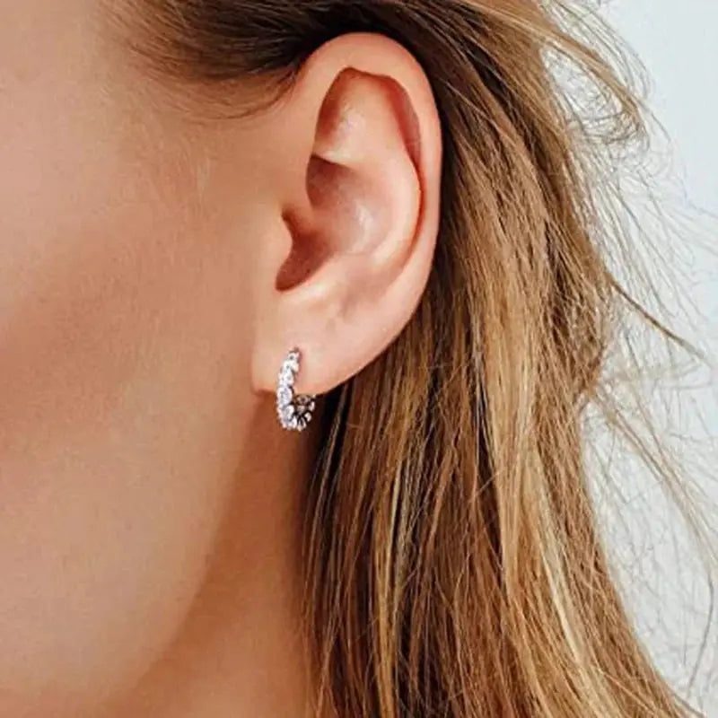 Huitan paved crystal CZ hoop earrings for women, silver-tone pave hoops.
