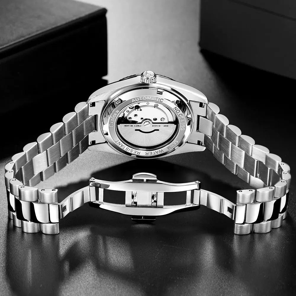 CADISEN men's mechanical watch with stainless steel bracelet and transparent exhibition case back showing movement