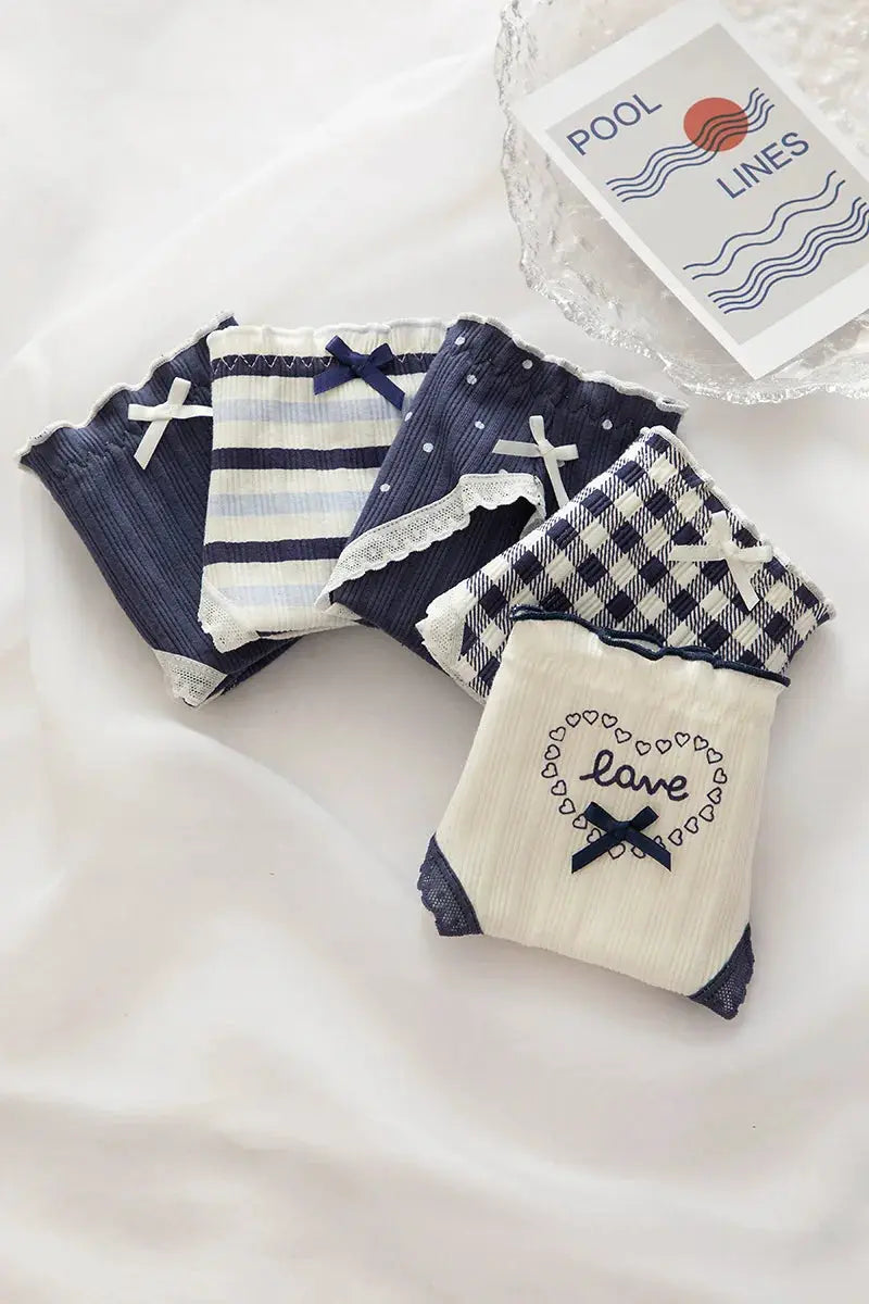 Cotton women's underwear set (5-pack) with mid-waist seamless panties and bow accents in navy stripes dots gingham