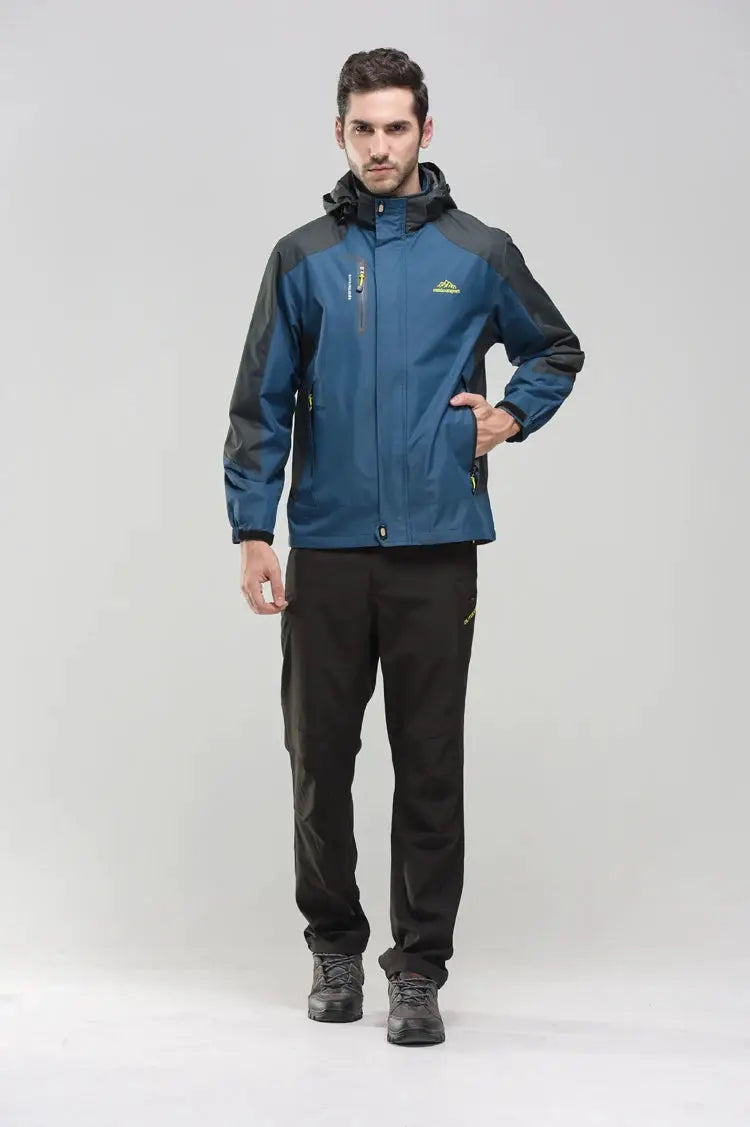 TRVLWEGO men's camping hiking jacket, blue with dark gray panels, waterproof windbreaker with hood