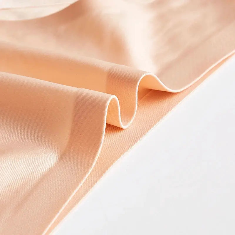 Women's seamless thong underwear in peach ice-silk fabric by Simples Market