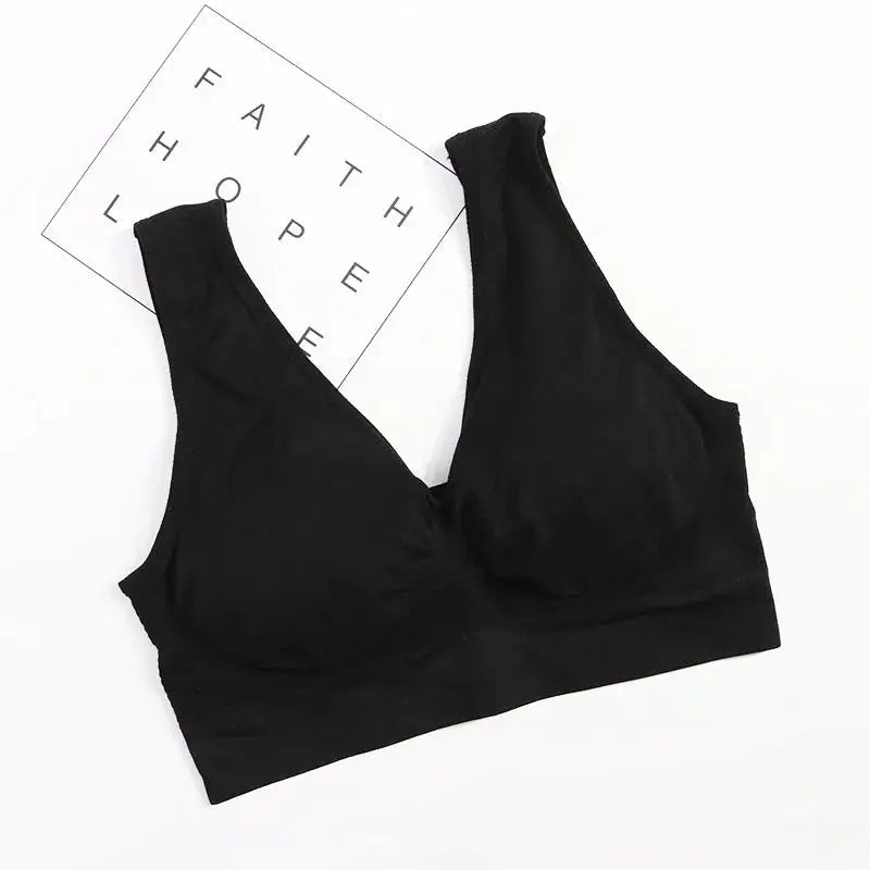 Black wireless push-up sports bra with double-layer seamless design for plus-size fitness, gym or yoga