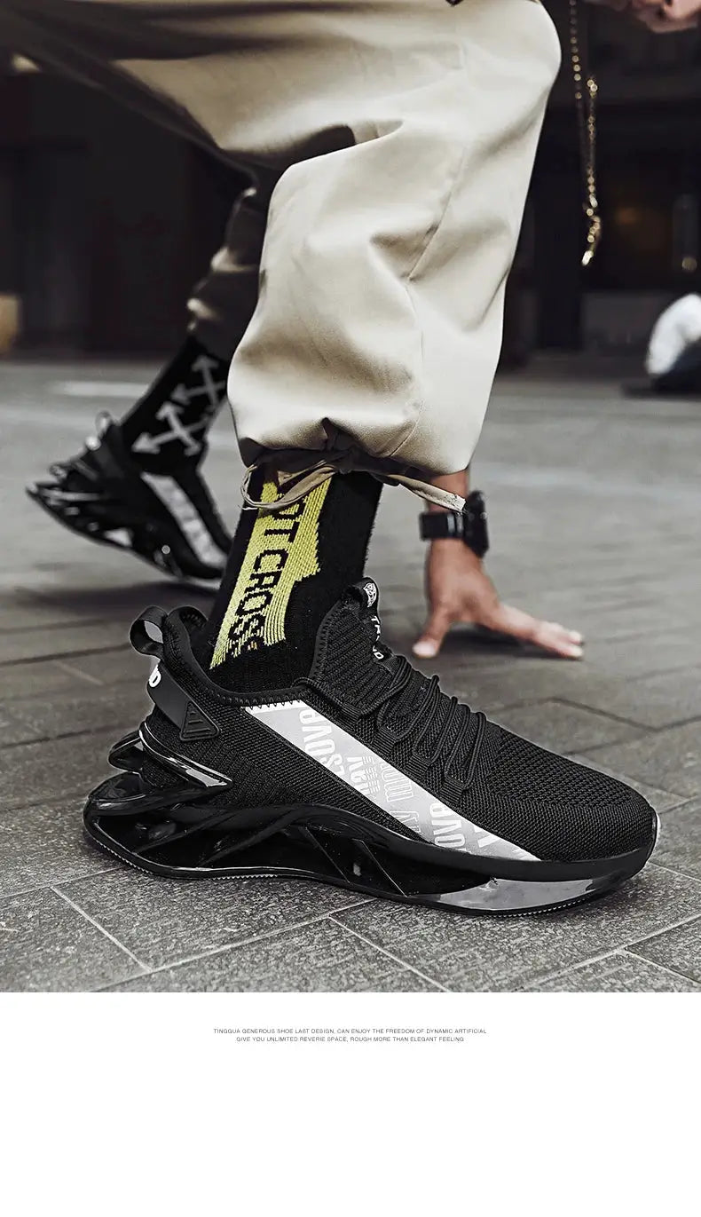 Simples Market men's black knit sneakers with a chunky black sole and gray side panel