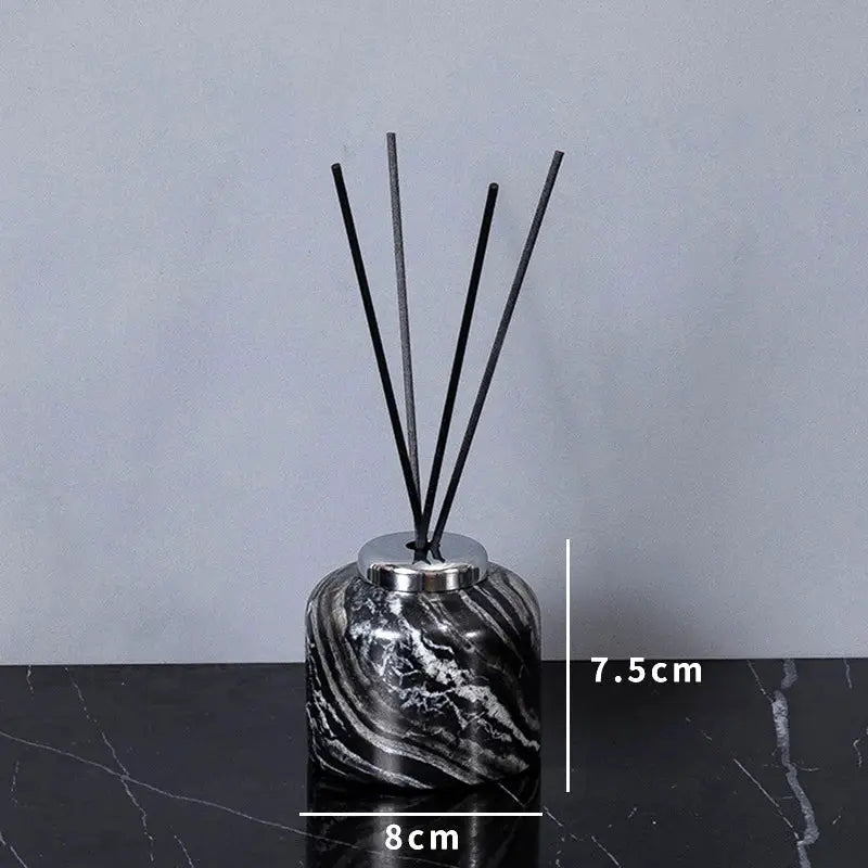 Simples Market black marble diffuser bottle with metal cap and black reed sticks
