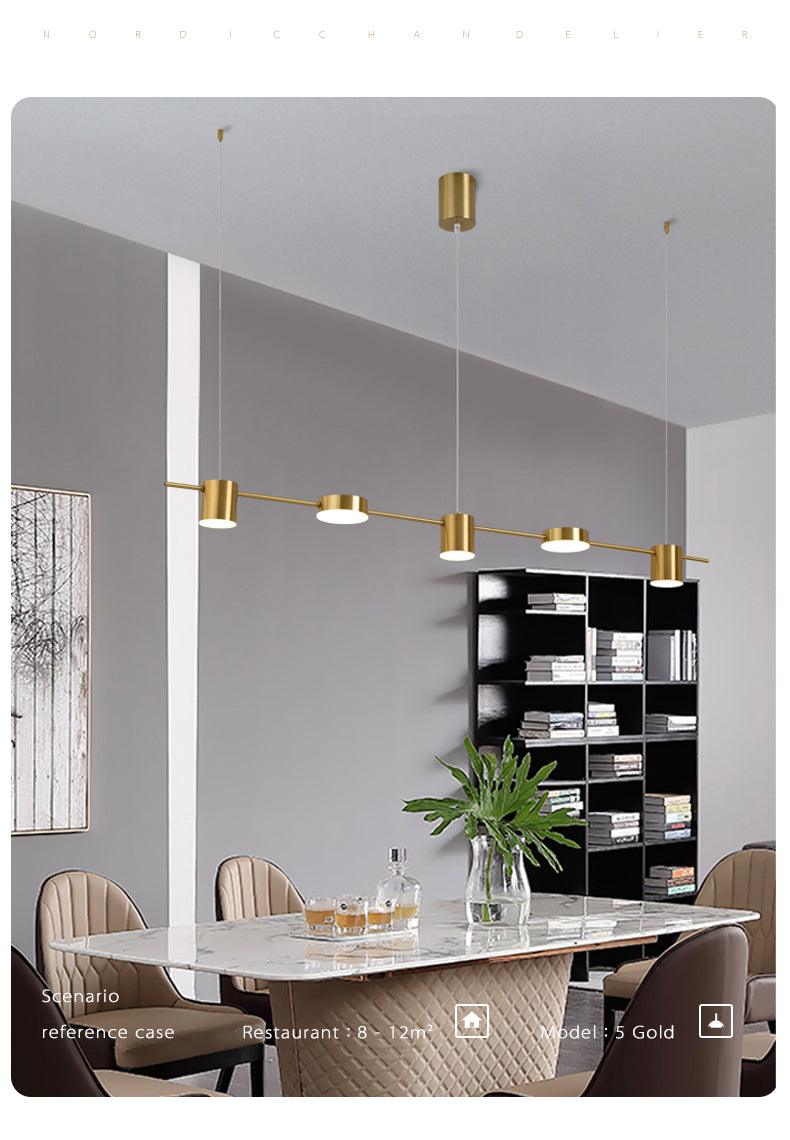 Gold metal linear LED chandelier with four light heads over a marble dining table