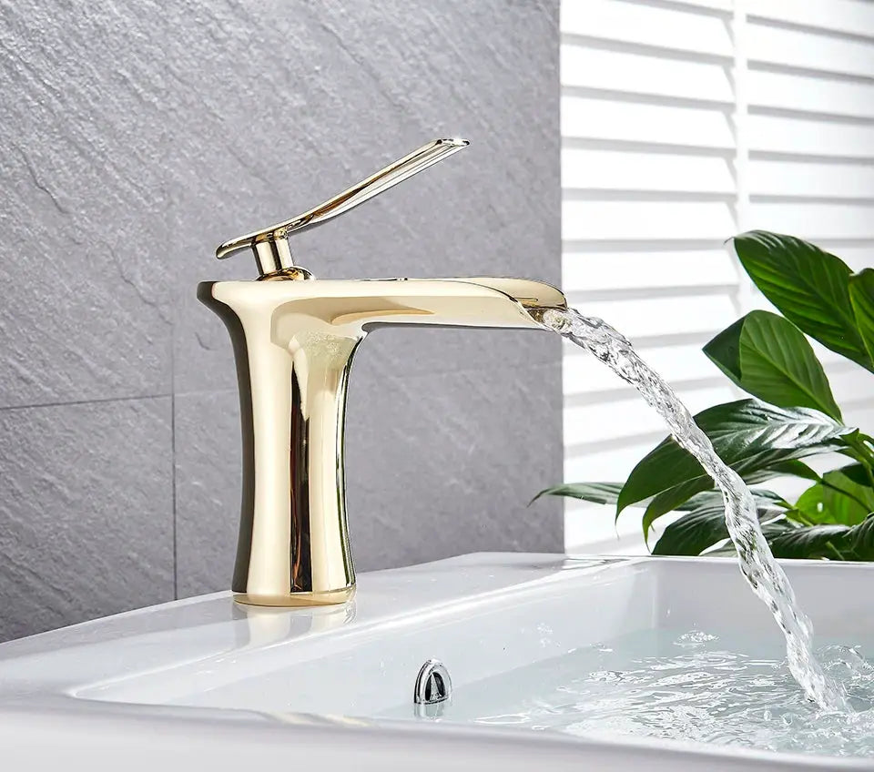 Antique brass basin faucet with single-handle waterfall spout for bathroom sink