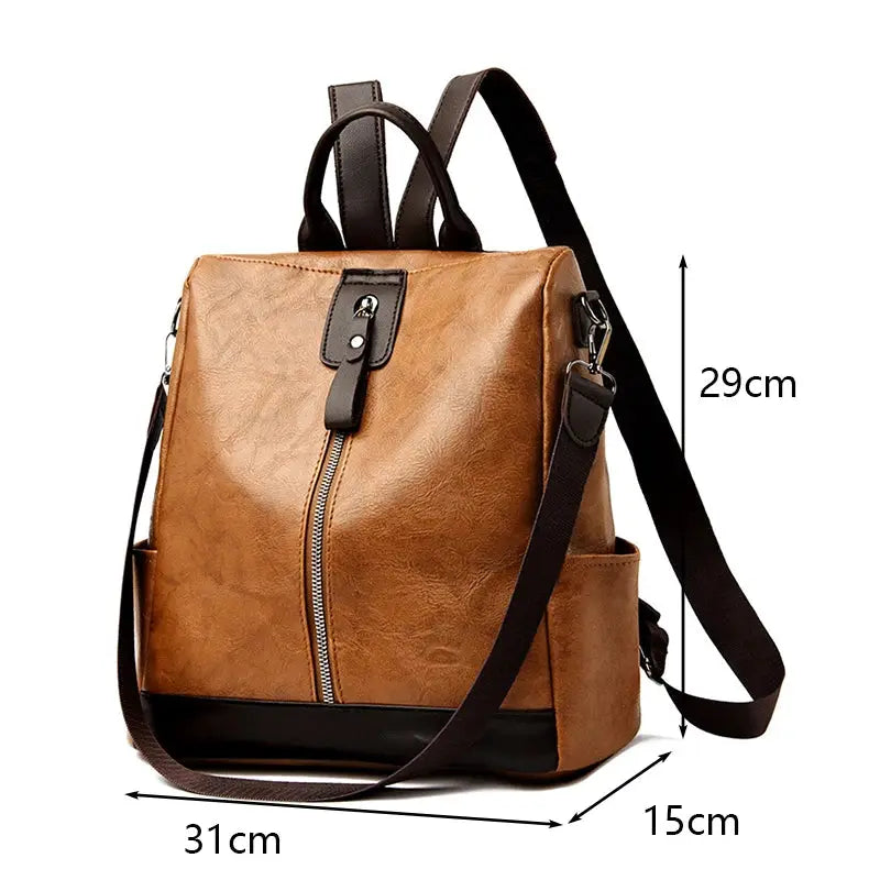 Brown PU leather anti-theft women backpack with top handles and adjustable strap, large capacity (31x29x15 cm).