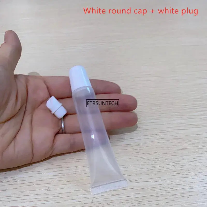 Clear lip gloss container by ETRSUNTECH with white round cap, empty lipstick tube
