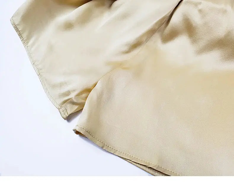 SuyaDream women’s 100% real silk shorts in cream beige with an elastic waistband