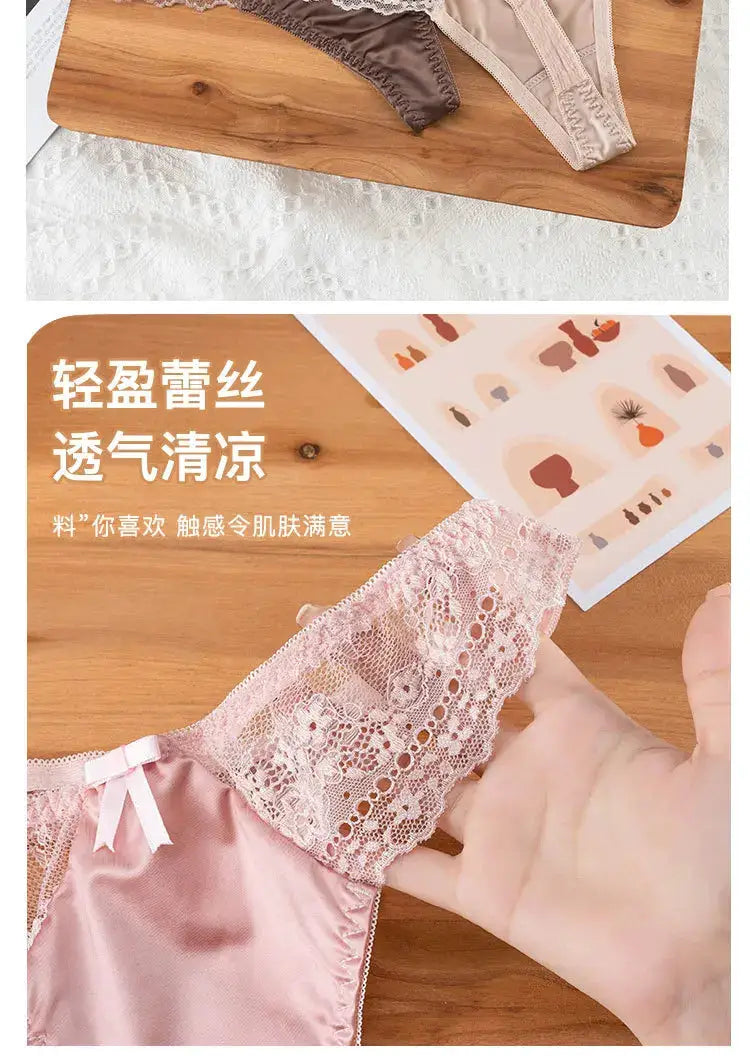 European-style lace thong from Simples Market, pink satin with lace overlay and bow.