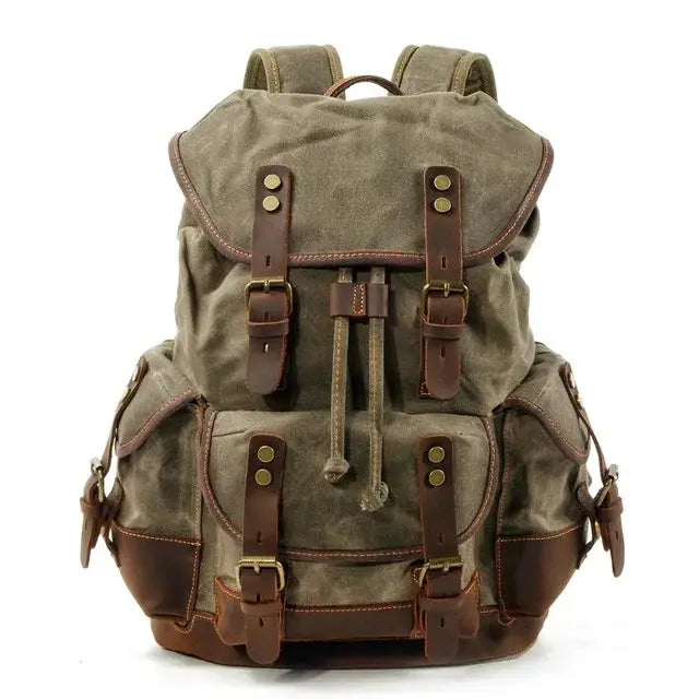 Simples Market vintage canvas backpack for men, olive waxed fabric with brown leather straps, large travel rucksack