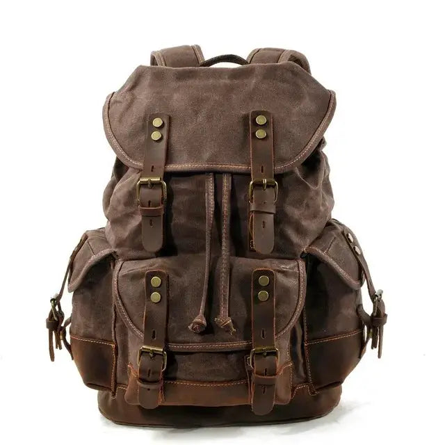 Vintage canvas backpack for men by Simples Market; brown waxed leather-trimmed rucksack with multiple pockets