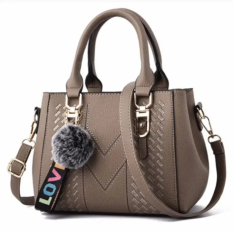 NovaLuxe PU Leather Messenger Bag For Women With Fur Ball Accent And Secure Zipper Closure